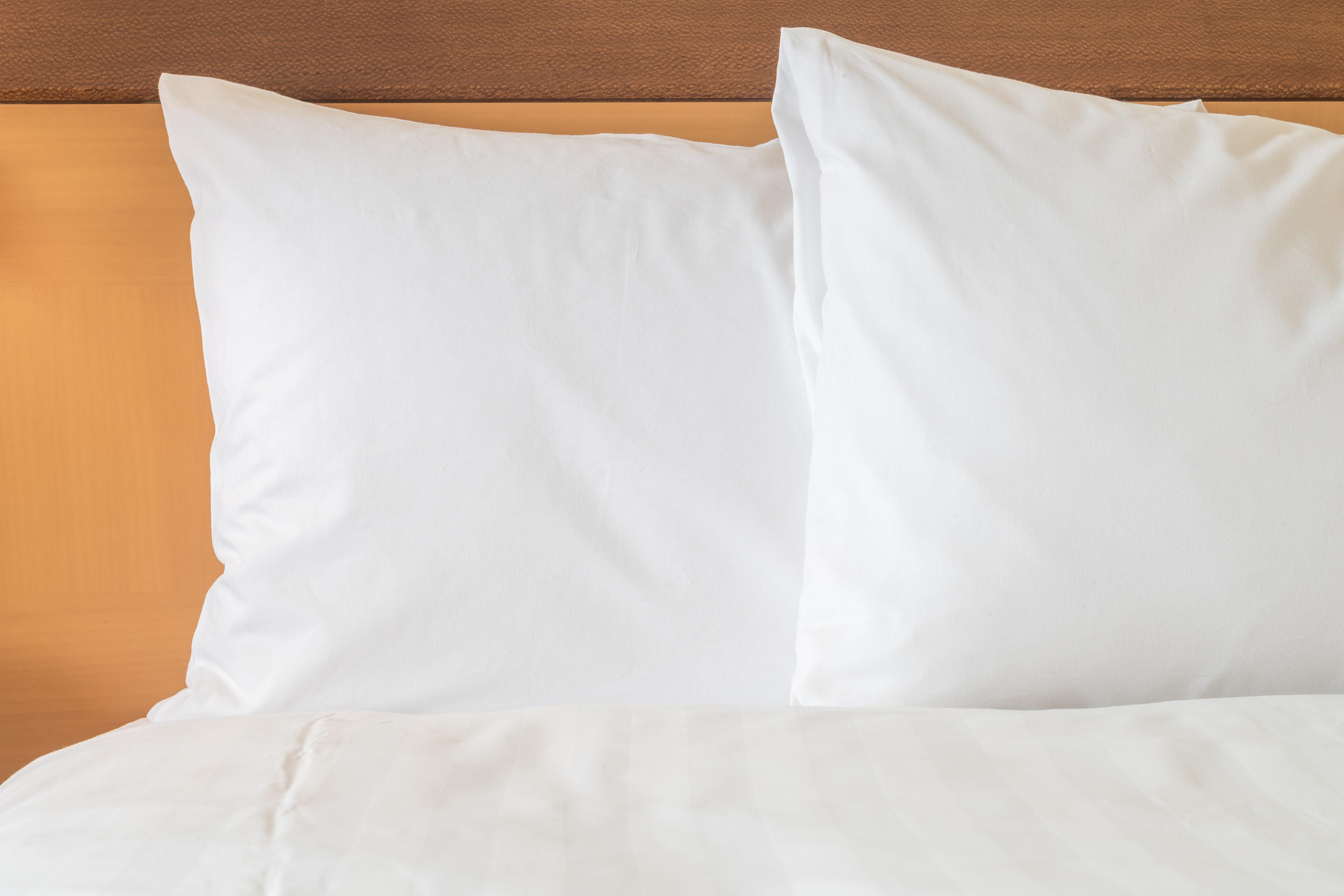 Holiday Inn Resort Bali Nusa Dua By Ihg Exterior photo Two pillows on a bed